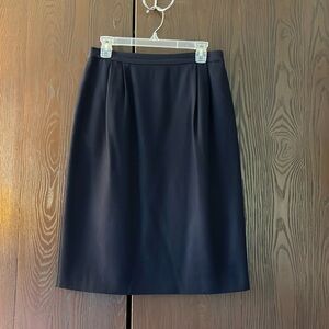 Cross Country navy blue wool skirt. Size 12.